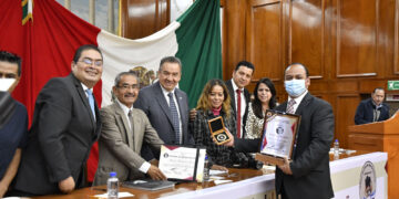 fotógrafa y fotógrafo