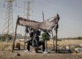 african american successful men came back in poor village